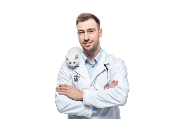 Smiling male veterinarian with kitten isolated on white background — Stock Photo