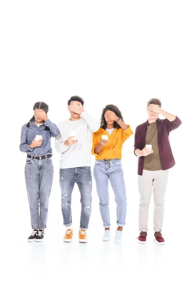 Vue obscurcie d'amis adolescents avec des smartphones isolés sur blanc — Photo de stock