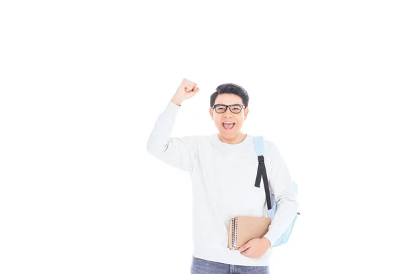 Portrait of happy asian student with notebooks isolated on white — Stock Photo