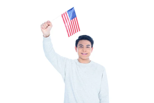 Happy teen asian student boy with usa flag isolated on white — Stock Photo