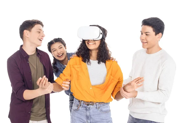 Group of teen students playing with vr headset isolated on white — Stock Photo