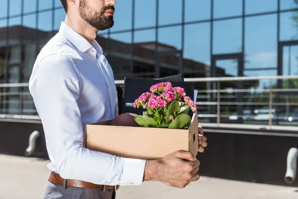 Cropped shot of manager with box of personal stuff after he was fired — Stock Photo
