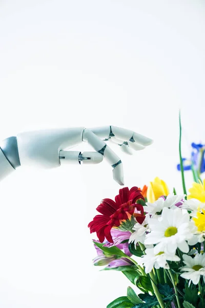 Close-up view of hand of robot and beautiful flower bouquet isolated on white — Stock Photo
