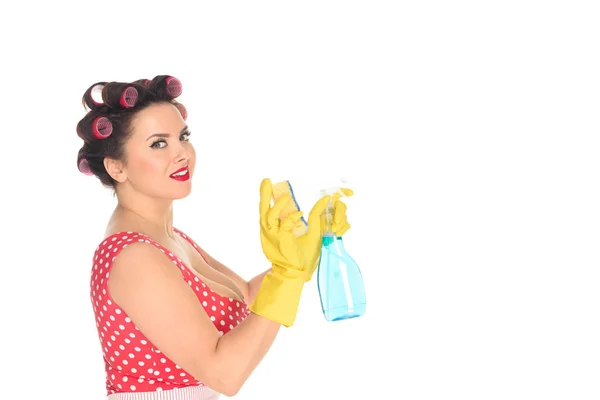 Side view of plus size woman in rubber gloves with cleaning supplies isolated on white — Stock Photo