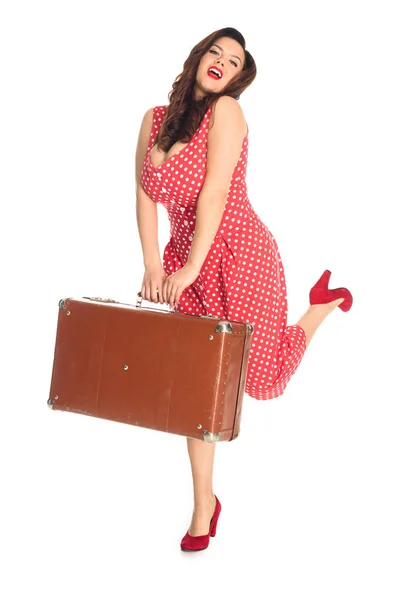 Happy plus size woman with vintage suitcase isolated on white — Stock Photo