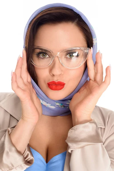 Close-up portrait of beautiful young woman in kerchief and stylish eyeglasses isolated on white — Stock Photo