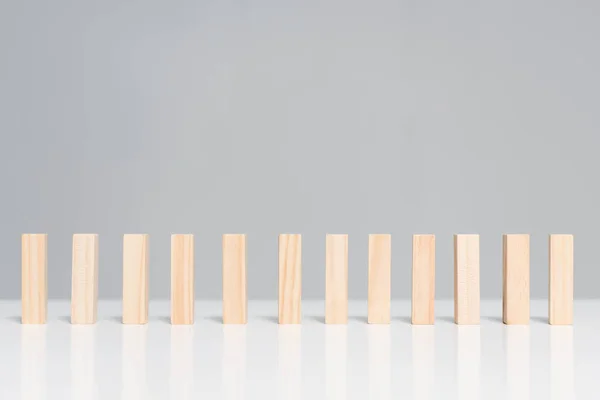 Wooden blocks isolated on grey with copy space — Stock Photo