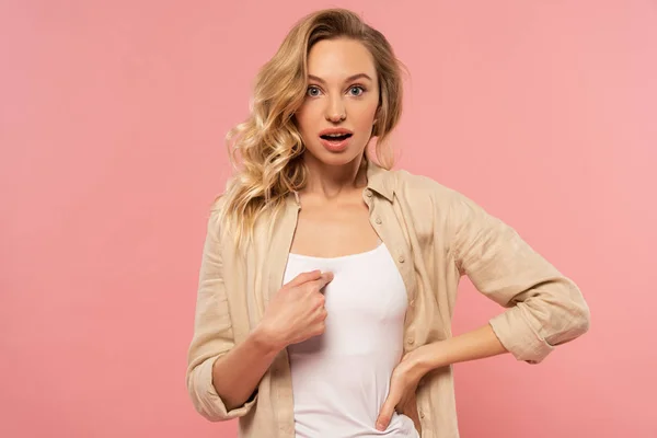 Shocked blonde woman point with finger on self isolated on pink — Stock Photo