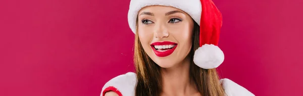 Smiling sexy beautiful santa girl isolated on burgundy, panoramic shot — Stock Photo