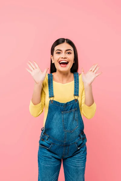 Excited pregnant pretty girl isolated on pink — Stock Photo