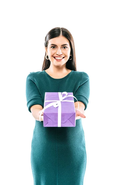 Smiling pregnant girl giving present isolated on white — Stock Photo