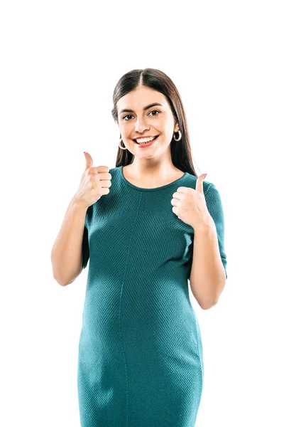 Усміхнена вагітна дівчина показує великі пальці вгору ізольовано на білому — стокове фото
