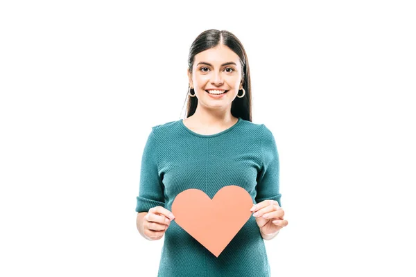 Smiling pregnant girl holding paper heart isolated on white — Stock Photo