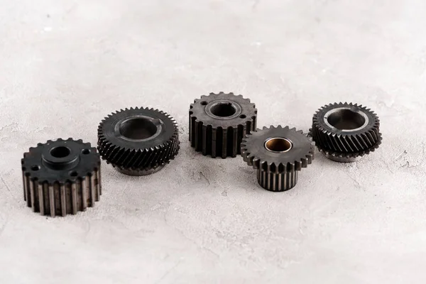Metal round gears on grey background — Stock Photo
