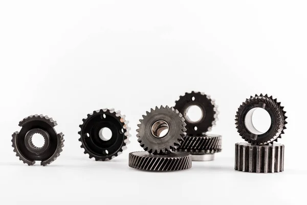 Metal round gears on white background with copy space — Stock Photo