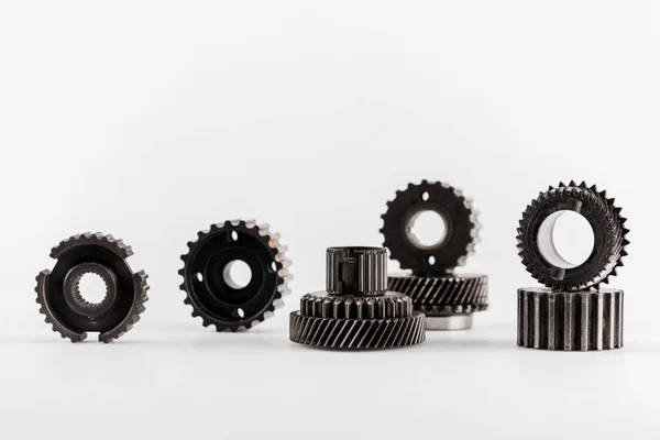 Metal round gears on white background with copy space — Stock Photo