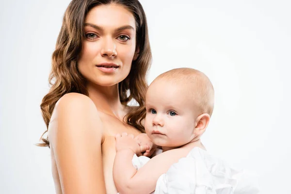 Portrait of nude mother holding baby boy, isolated on white — Stock Photo
