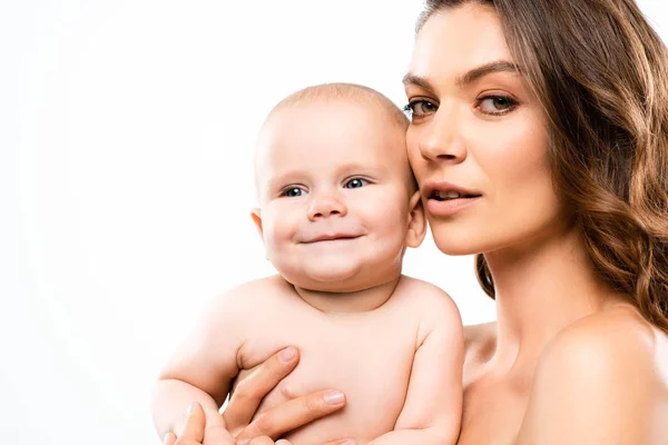 Portrait of naked mother holding happy baby, isolated on white — Stock Photo