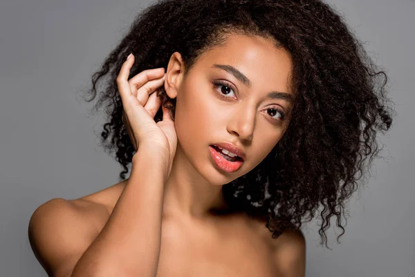 Portrait of naked curly african american girl, isolated on grey — Stock Photo