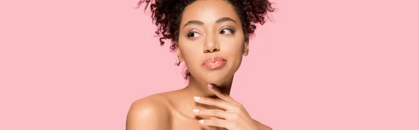 Panoramic shot of smiling african american girl with clean face, isolated on pink — Stock Photo