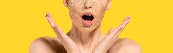 Cropped view of naked shocked girl with mask, isolated on yellow, panoramic shot — Stock Photo