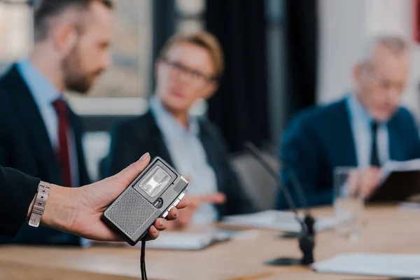 Selective focus of journalist holding voice recorder near diplomats — Stock Photo