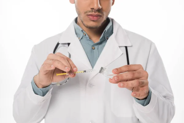 Cropped view of doctor picking up vaccine in syringe isolated on white — Stock Photo