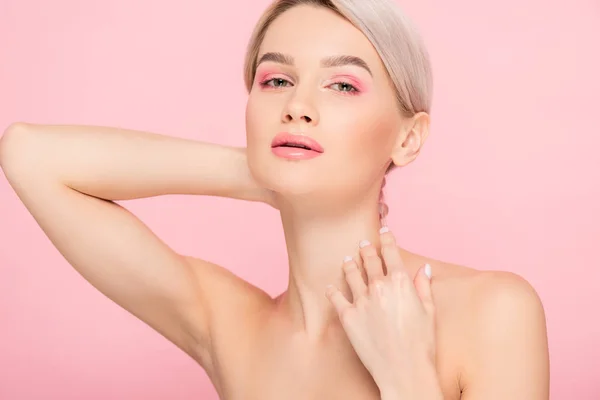 Sensual nude girl with pink makeup, isolated on pink — Stock Photo