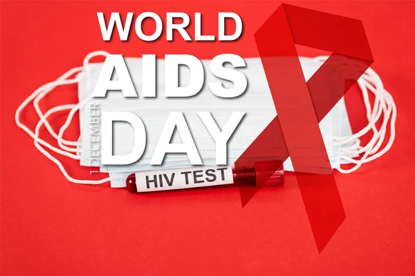 Sample with hiv test near protective medical masks and world aids day lettering on red — Stock Photo