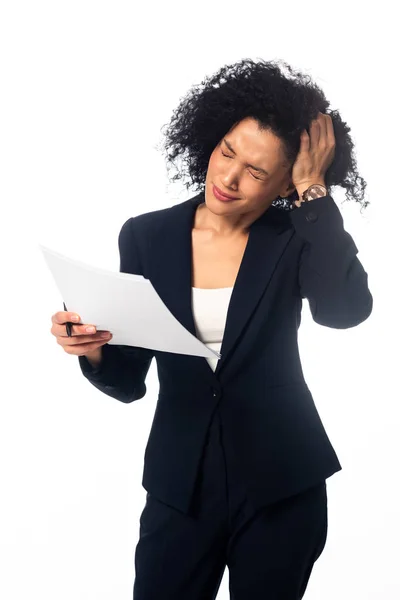 Front view of african american woman with papers suffering from headache isolated on white — Stock Photo