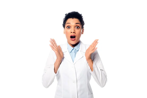 Front view of shocked and surprised african american doctor looking at camera isolated on white — Stock Photo