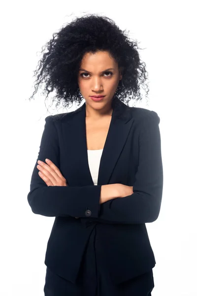 Front view of angry african american businesswoman with crossed arms looking at camera isolated on white — Stock Photo