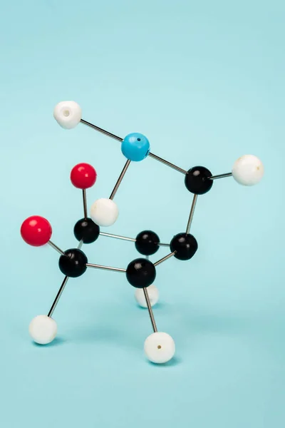 Construction of hormone molecular formula on blue background — Stock Photo