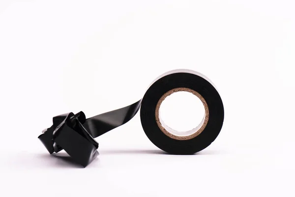 Sticky and black scotch tape on white — Stock Photo