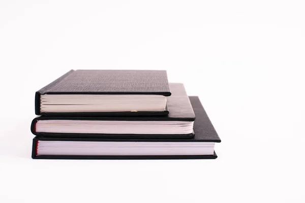 Black copy books isolated on white with copy space — Stock Photo