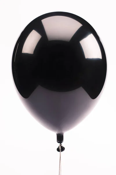 Чорна і блискуча повітряна куля ізольована на білому — стокове фото