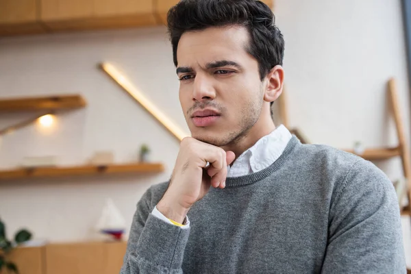 Portrait of thoughtful businessman in office — Stock Photo