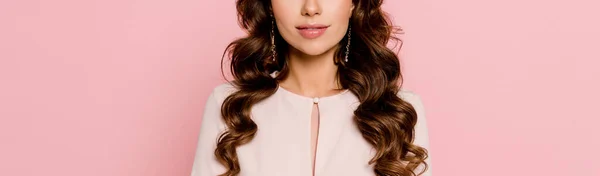 Panoramic shot of young woman standing isolated on pink — Stock Photo