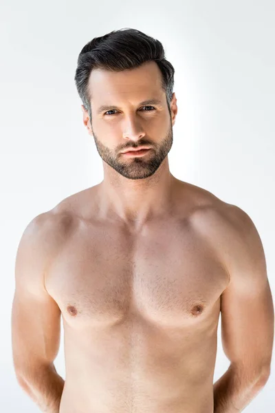 Shirtless man looking at camera isolated on white — Stock Photo