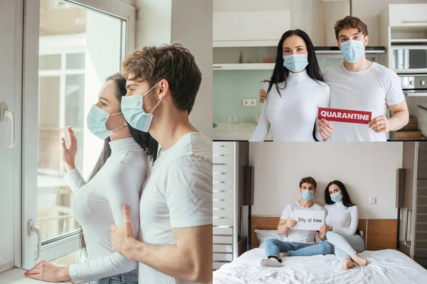 Couple malade dans des masques médicaux tenant le signe Rester à la maison, signe de quarantaine et regarder par la fenêtre pendant l'isolement personnel — Photo de stock