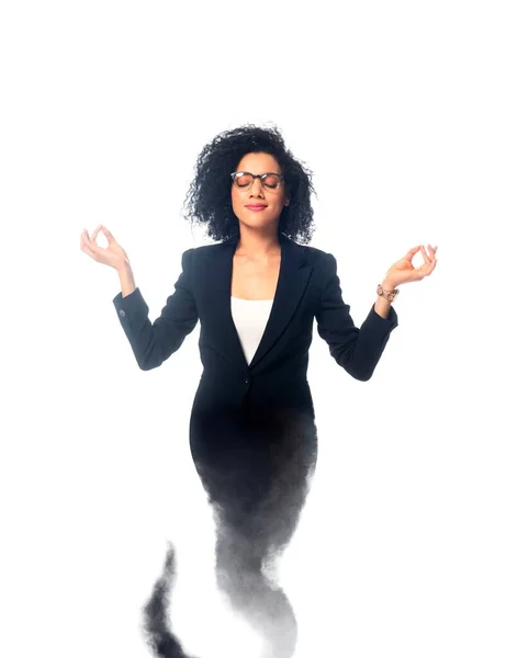 African american businesswoman with closed eyes meditating as jinn isolated on white — Stock Photo
