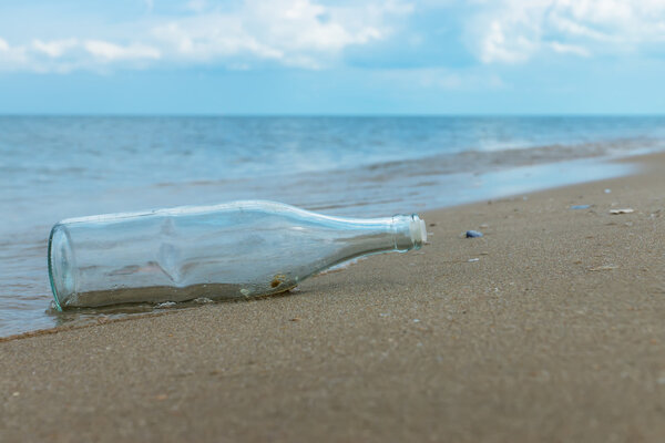 Glass bottles on the beach