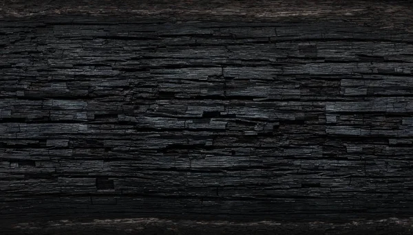 Details over het oppervlak van houtskool. — Stockfoto