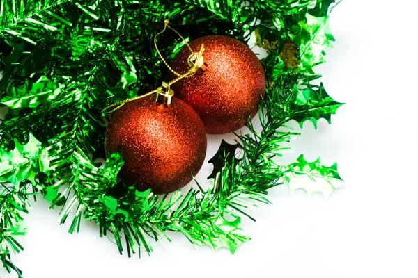 Christmas balls and ribbon in winter setting. — Stock Photo, Image