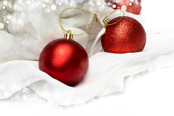 Close up christmas ball on white fabric. — Stock Photo, Image