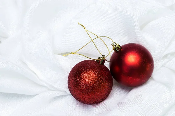 Close up christmas ball on white fabric. — Stock Photo, Image
