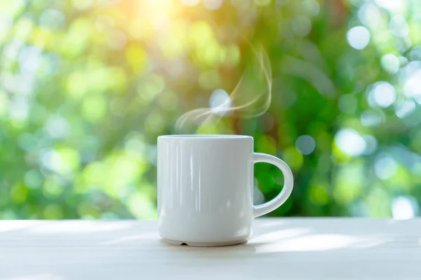 White coffee cup in the morning time — Stock Photo, Image