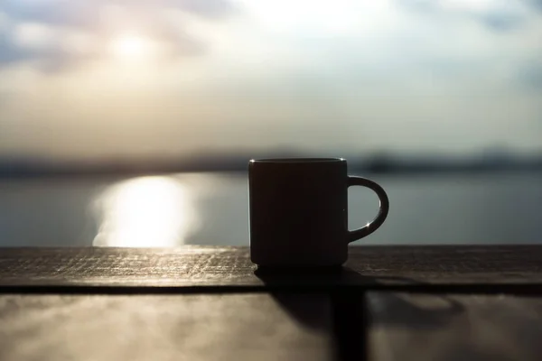 White coffee mug in the morning time — Stock Photo, Image