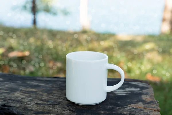 White coffee mug in the morning time — Stock Photo, Image