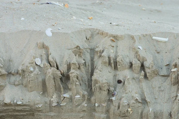 Lager av sand på stranden. — Stockfoto